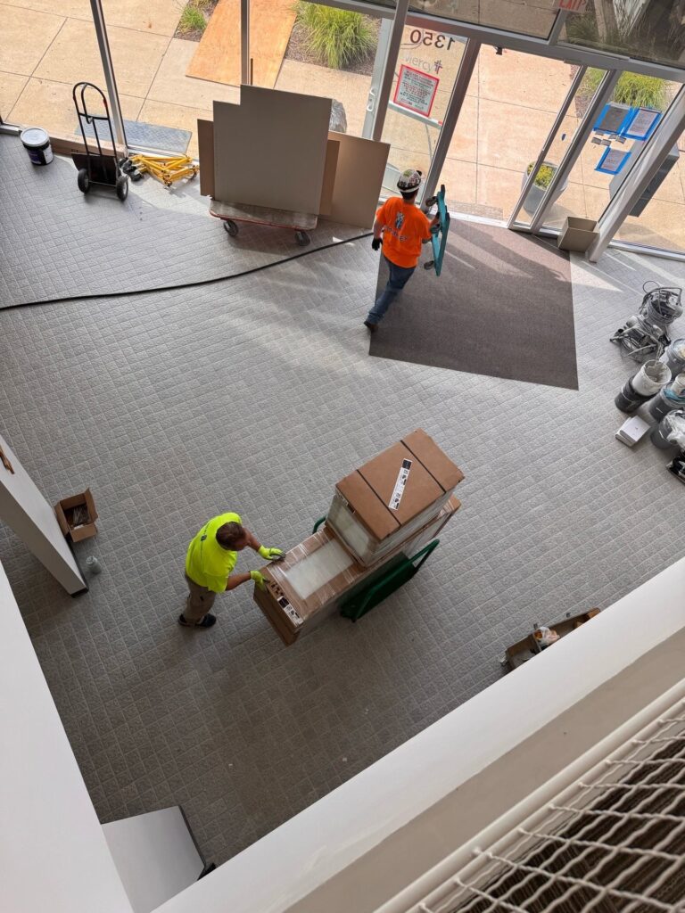 Commercial furniture installation crew performing a white-glove office move