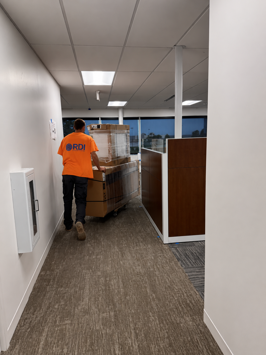 RDI crew delivering office furniture for an installation project
