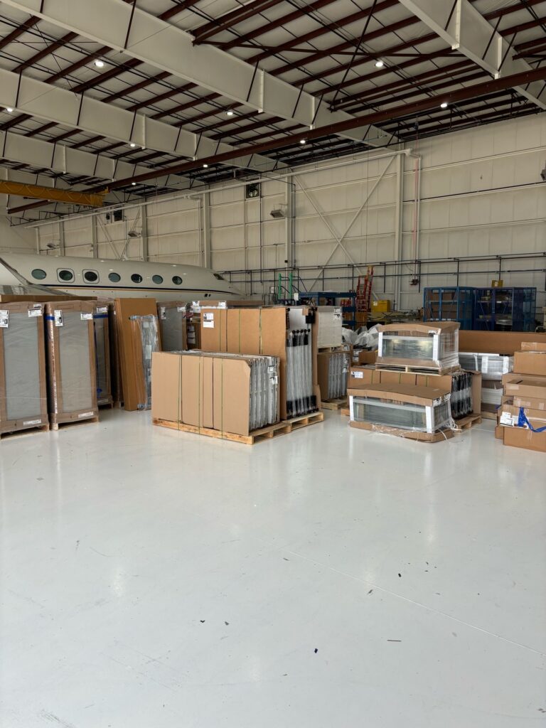 received and stored furniture in airport hanger